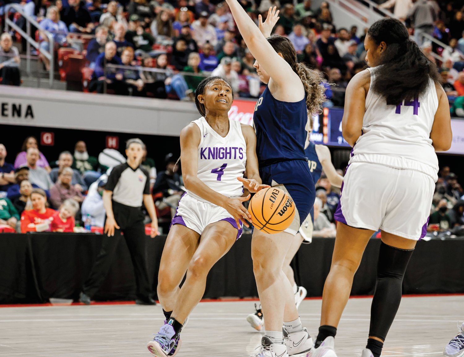 Chatham Charter senior Tamaya Walden (4) had 11 points Saturday against Bishop McGuinness in the 1A girls state final.